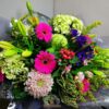 Clashy colours in this hand-tied bouquet are just a great choice whatever the occasion