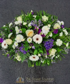Purple and White Double Ended Casket Spray - The Flower Fountain Funeral Flowers Stoke on Trent