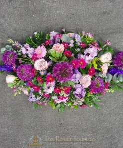 Lilac and Purple Cottage Garden Style Double Ended Casket Spray - The Flower Fountain Funeral Florists Stoke on Trent