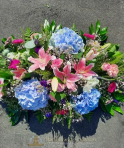 Pink, Purple and Blue Double Ended Casket Spray - The Flower Fountain Funeral Florists Stoke on Trent