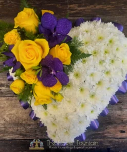 Yellow and Purple Based Heart Funeral Tribute | The Flower Fountain | Funeral Flowers Stoke on Trent