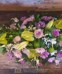 Lilac and Green Single Ended Spray - The Flower Fountain Funeral Flowers Stoke on Trent