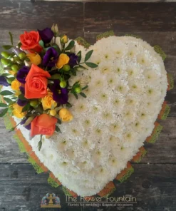 Vibrant Based Heart Funeral Tribute | The Flower Fountain | Funeral Flowers Stoke on Trent