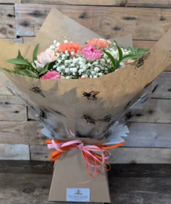 The Carnation One is a soft and timeless bouquet in our “Nice” size. A mix of carnations, gypsophila and foliage. Delivery across Stoke-on-Trent.