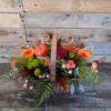 Autumn Harvest Basket filled with seasonal flowers, berries, and rustic foliage, available for delivery in Stoke-on-Trent.