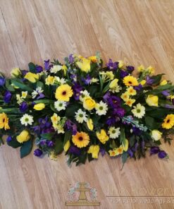 Funeral_Tributes - purple-yellow-and-white-casketspray2